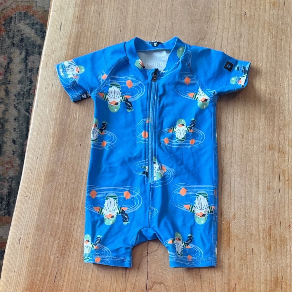Blue Baby Swimsuit with pirate Print